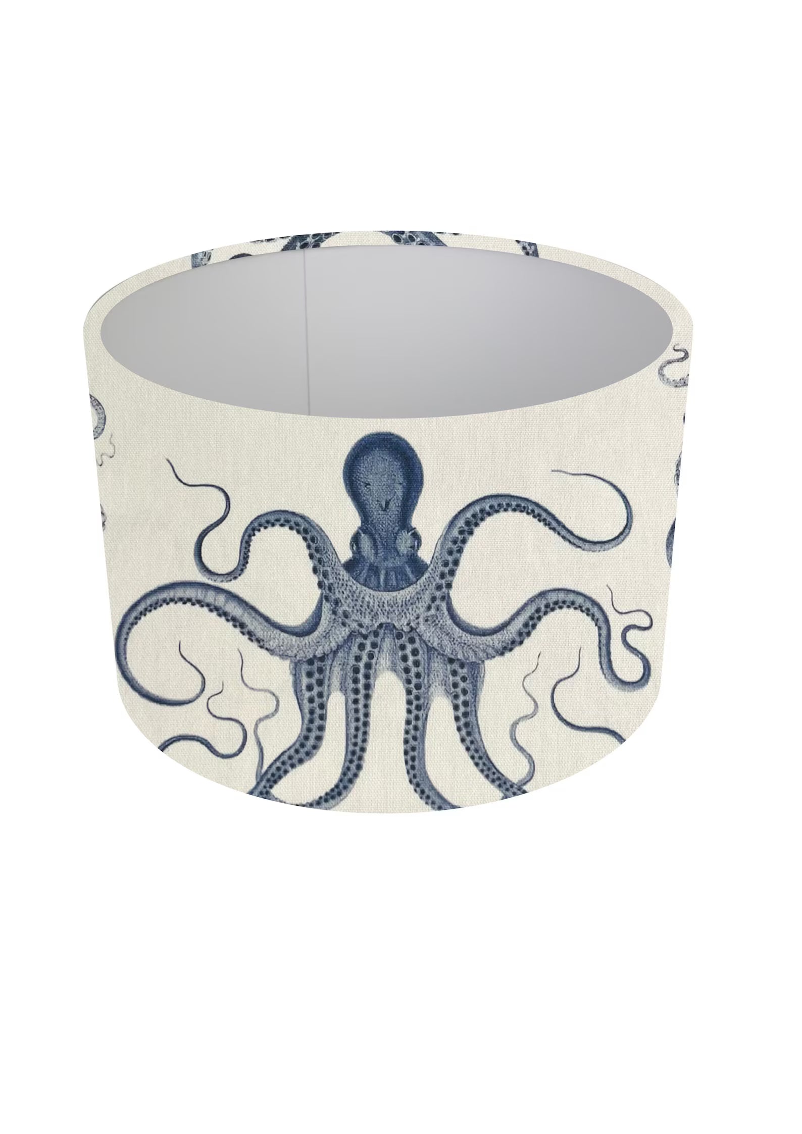 A cylindrical lampshade featuring a blue octopus illustration printed on an off-white linen-textured background, shown against a plain white studio backdrop.